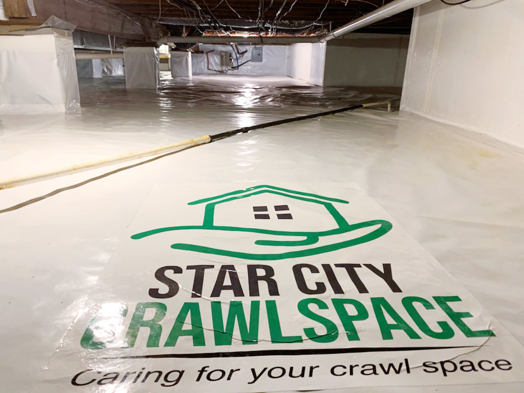 Crawlspace encapsulation with company logo